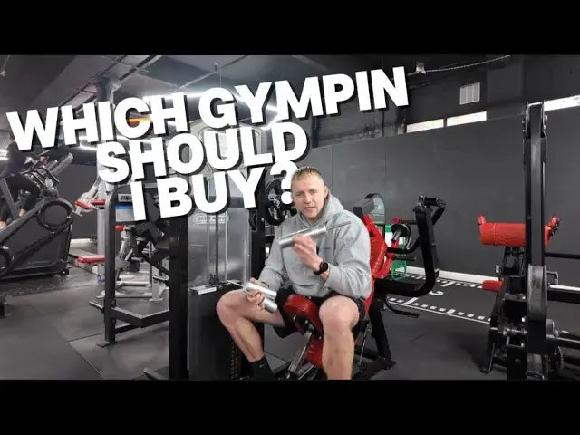 Man sitting in gym, pointing while asking 'Which GymPin Should I Buy?' on gym equipment.