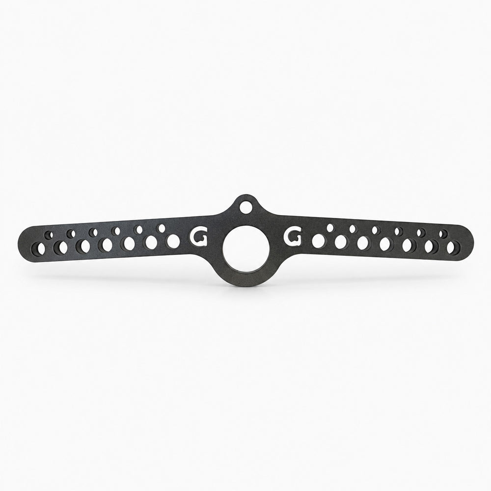 Black metal bracket with multiple holes on a white background