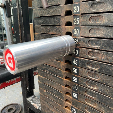 The Original GymPin inserted into weight stack for enhanced strength training and progressive overload.