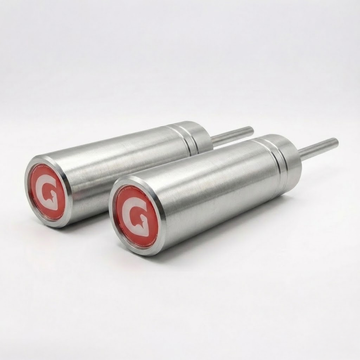 Two silver GymPins with red G logos on a white background
