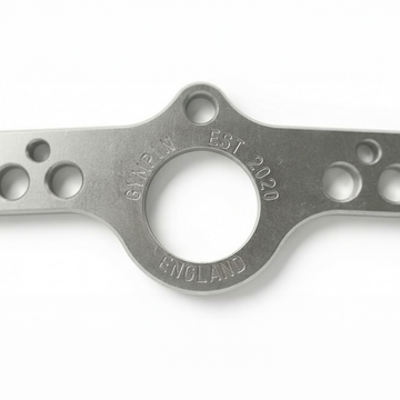 Metal component with 'GYPIN' branding and 'EST. 2020' text on a white background