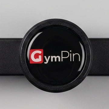 Black circular device with 'GymPin' logo on a light gray background Hyper Loader