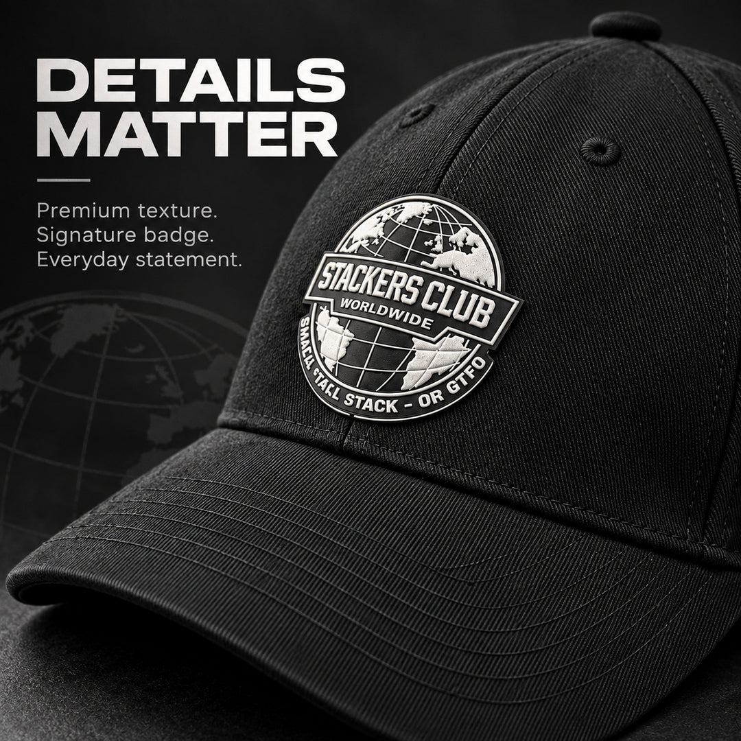 Close up of Stackers Club Worldwide badge on black gym cap