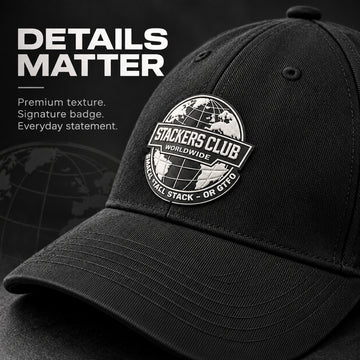 Close up of Stackers Club Worldwide badge on black gym cap